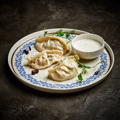 Манты с говядиной в Гранат по цене 520 ₽