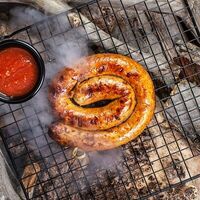 Жареная куриная колбаска с гарниром в 7 небо