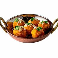 Крокеты Кафе де Пари в Mama Roasta Rotisserie