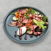 Салат с говядиной, каймаком и малиновым соусом в Балкан Петроградский по цене 970