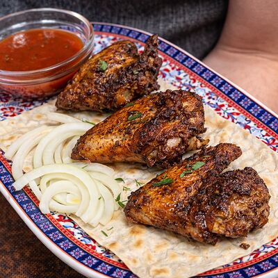 Шашлык из куриных крылышек в Тминъ по цене 270 ₽