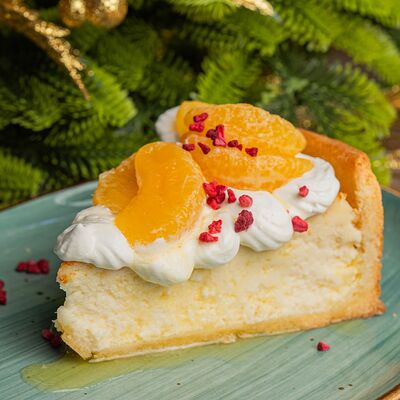 Чизкейк с мандаринами в Eva bistro по цене 380 ₽