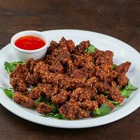 Баранина в панировке со специямив Пекин