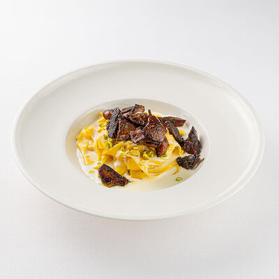 Домашние тальятелле с таледжио и белыми грибами в La Scala Trattoria Ignazio по цене 54 р.