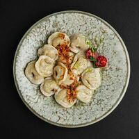 Пельмени с форелью и Судаком в сливочном соусе в Олива