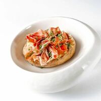 Печеный картофель с костным мозгом и пармойв Dodici Grill
