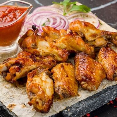 Куриные крылышки барбекю в Шашлык Хауз по цене 320 ₽