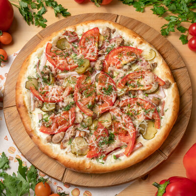 Пицца Мясное ассорти в Фуд Корт №1 по цене 720 ₽