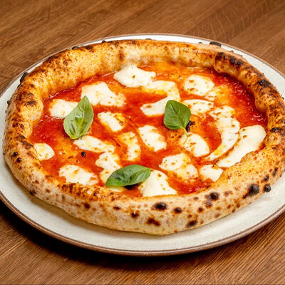 Пицца Маргарита в Il Pizzaiolo по цене 660 ₽