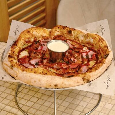 Пицца с курицей, салями и окороком 28см в Мари по цене 910 ₽