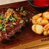 Свиные рёбра в соусе BBQ в Мадьяр-Гриль по цене 870