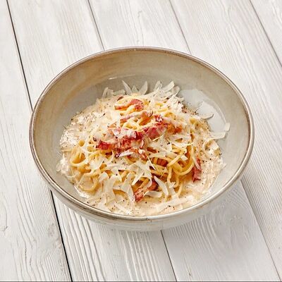 Спагетти Карбонара в Пармезан по цене 565 ₽