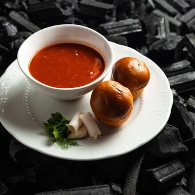 Борщ с томлёной говядиной в Dodici Grill по цене 970 ₽