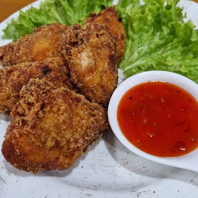 Острые куриные крылышки с соусом свит чили в Puri по цене 550 ₽