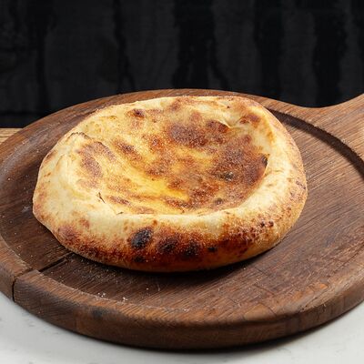 Лепешка из печи в Cheeseria по цене 300 ₽