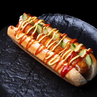 Хот-дог с куриными наггетсами в Amigoos по цене 290 ₽