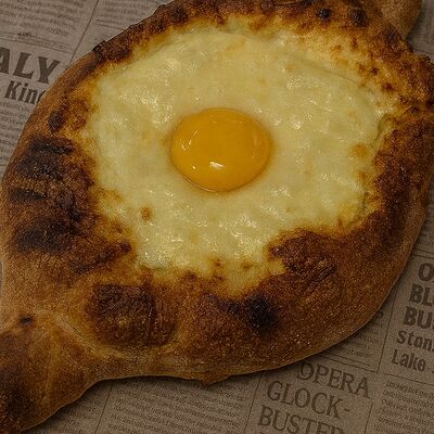 Хачапури Лодочка с беконом в Сметанин Пицца по цене 650 ₽