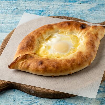 По-аджарски с сырными бортами в Хачапури & Кофе по цене 560 ₽