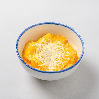 Токпокки в сырном соусев NYUSURI корейская кухня по цене 490 ₽