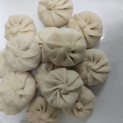 Момо, сливочный творожный сыр, пармезан.в Зелёный чебурек по цене 1169 ₽