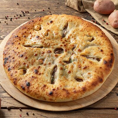 Осетинский пирог с картошкой и говяжьим мясом в Осетинские пироги от Альды по цене 825