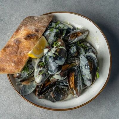 Мидии в соусе чкмерули в Буржуй по цене 1100 ₽