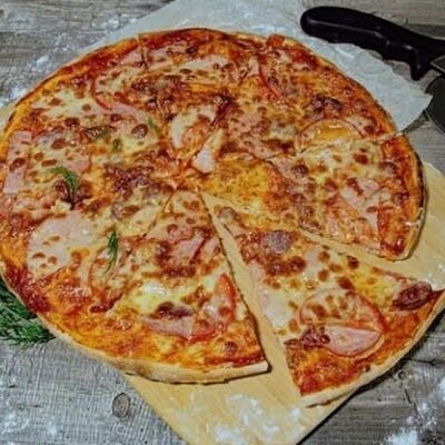 Пицца Мясная в Pizza e birra по цене 975 ₽