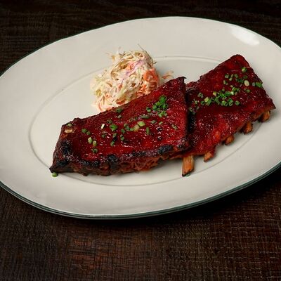 Свиные рёбра BBQ в Dacha restaurant по цене 1210 ₽