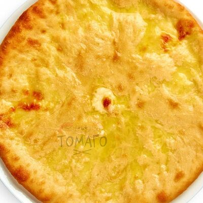 Осетинский пирог с картофелем в Томаго по цене 990 ₽