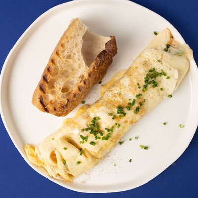 Омлет с овощами и томатным джемомв Tine по цене 390 ₽