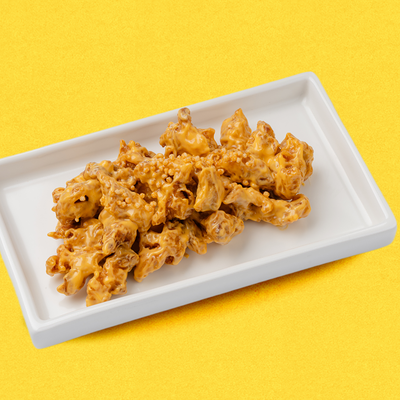 Чикен байтсы в сырном соусе в Чико по цене 470 ₽