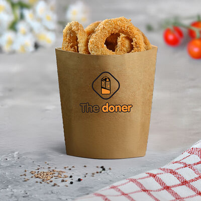 Луковые кольца в панировке в The doner по цене 85 ₽