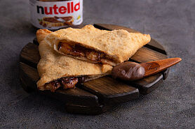 Панцеротти Nutella и банан в SushiKent по цене 460 ₽