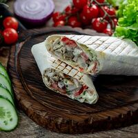 С соусом бургер и куриной грудкой в Мясо & Лаваш