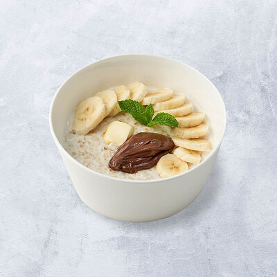 Овсяная каша с бананом и шоколадом в Vaffel по цене 390 ₽