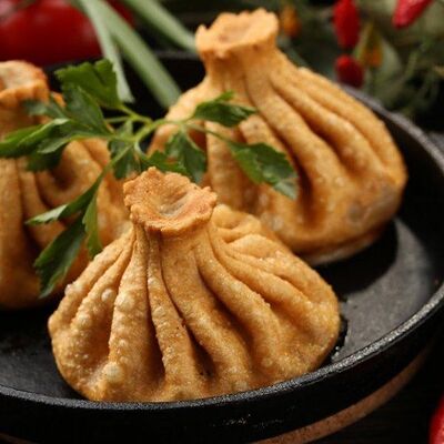 Жареные хинкали с говядинойв Каретный дворик по цене 620 ₽