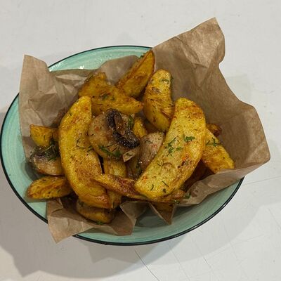 Жареный картофель с грибами в Гостиный дворик по цене 320 ₽