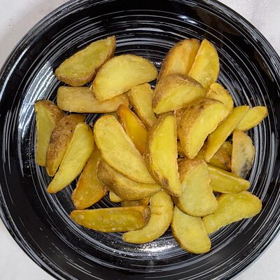 Картофель по-деревенски в Сказка lounge по цене 280 ₽