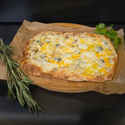 Пицца Римская четыре сыра в Трасса по цене 849 ₽