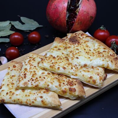 Хачапури по-мегрельски маленькое в Хачапуридзе по цене 320 ₽