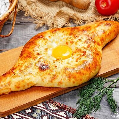 Хачапури по-аджарски (лодочка) в Тандырофф по цене 520 ₽