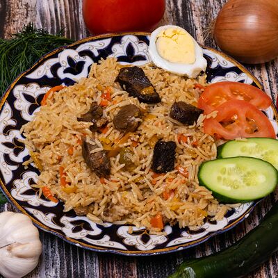 Плов узбекский в Пан Чебурек по цене 550 ₽