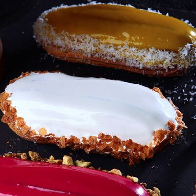 Эклер манго-маракуйя в Белая черешня по цене 210 ₽