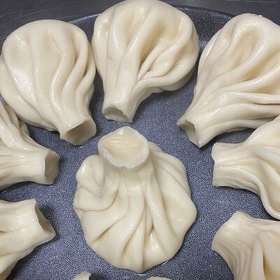 Хинкали с сыром в Тамада по цене 550 ₽