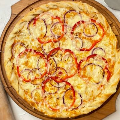 Пицца Полла пиканта в Pizza della Casa по цене 469 ₽