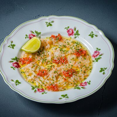 Карпаччо из креветки лангустино в Florentini City Café по цене 1250 ₽