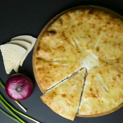 Осетинский пирог с сыром Уалибах в Pizzarion по цене 893 ₽