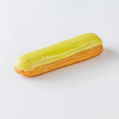 Эклер фисташковый в Волконский по цене 290 ₽