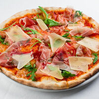 Пицца с пармой и руколой в Итальянец