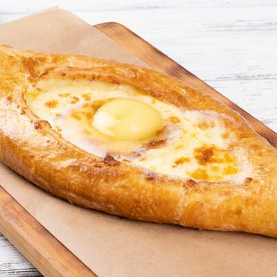 Хачапури по-аджарски в На речке по цене 560 ₽